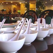 Picture Of Bowls And Spoons In Chinese Restaurant